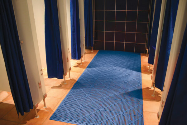 Blue mat in a communal shower floor or changing room