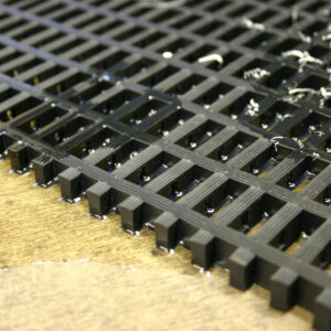 close up of black Heavy Duty Woven PVC Mat