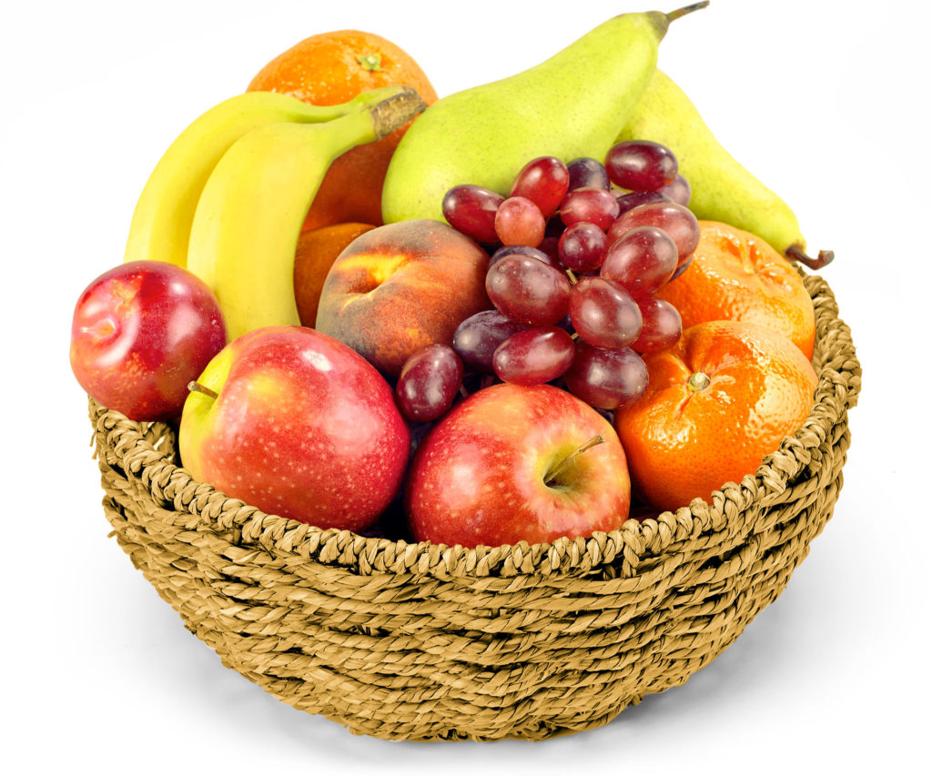 Pieces of different fruits in a wicker bowl